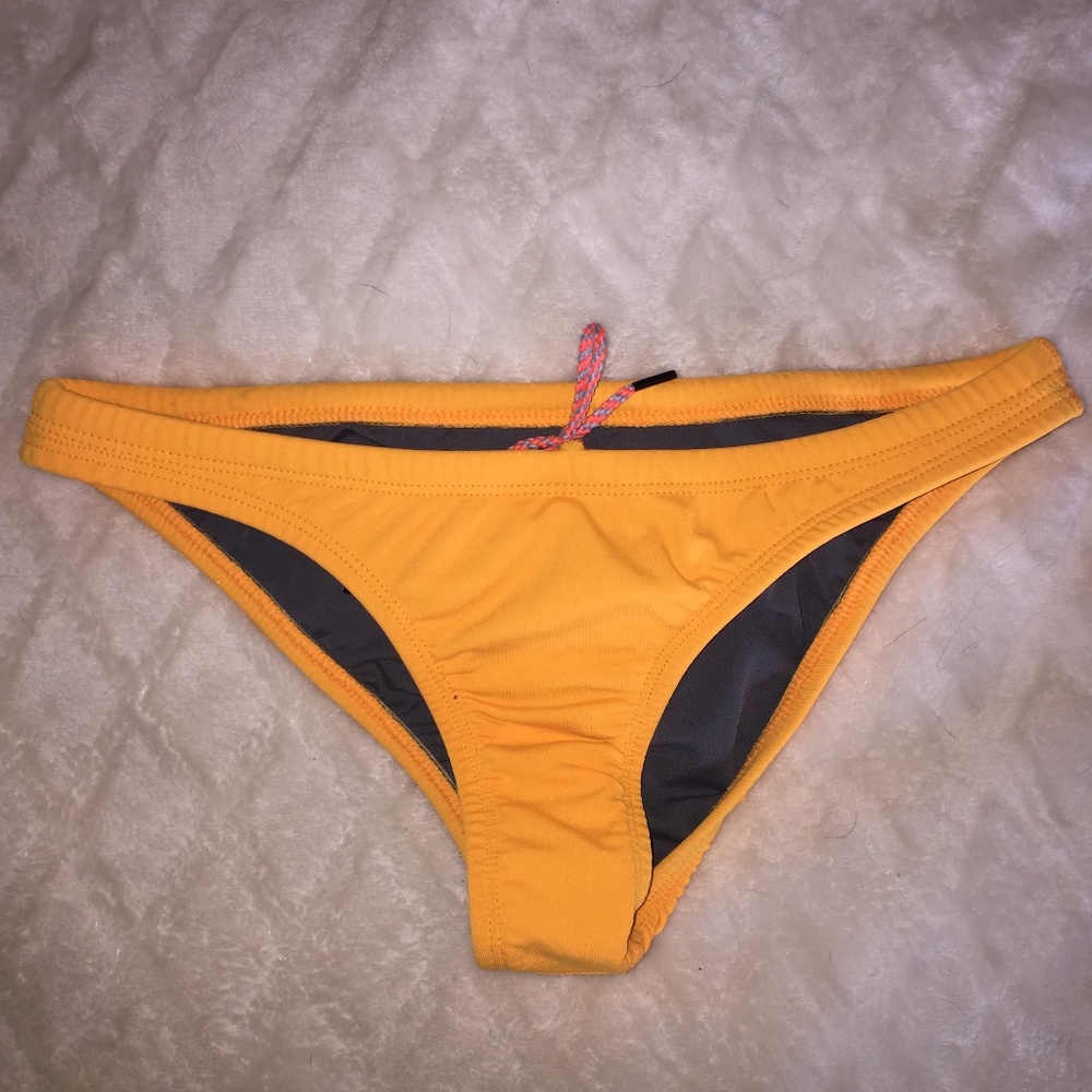 JOLYN Europe Swim Bottoms | Orange/yellow